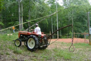 Roy brings the tractor in